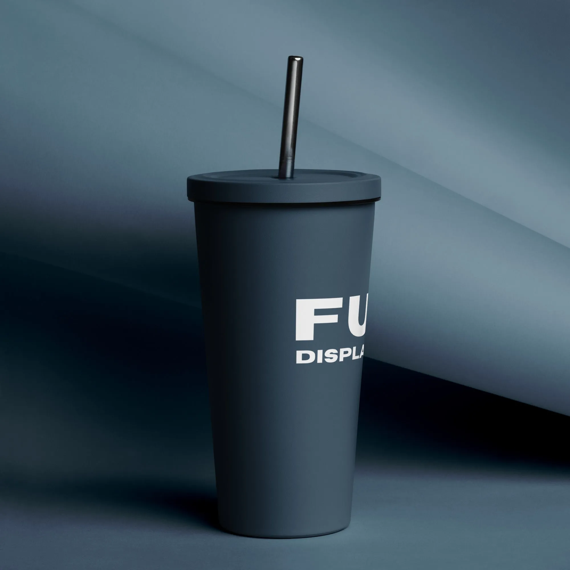 20 oz. Insulated tumbler with a straw in navy with white FULL DISPLACEMENT logo